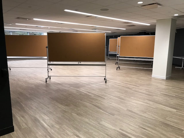 Empty room with movable walls and a wooden floor